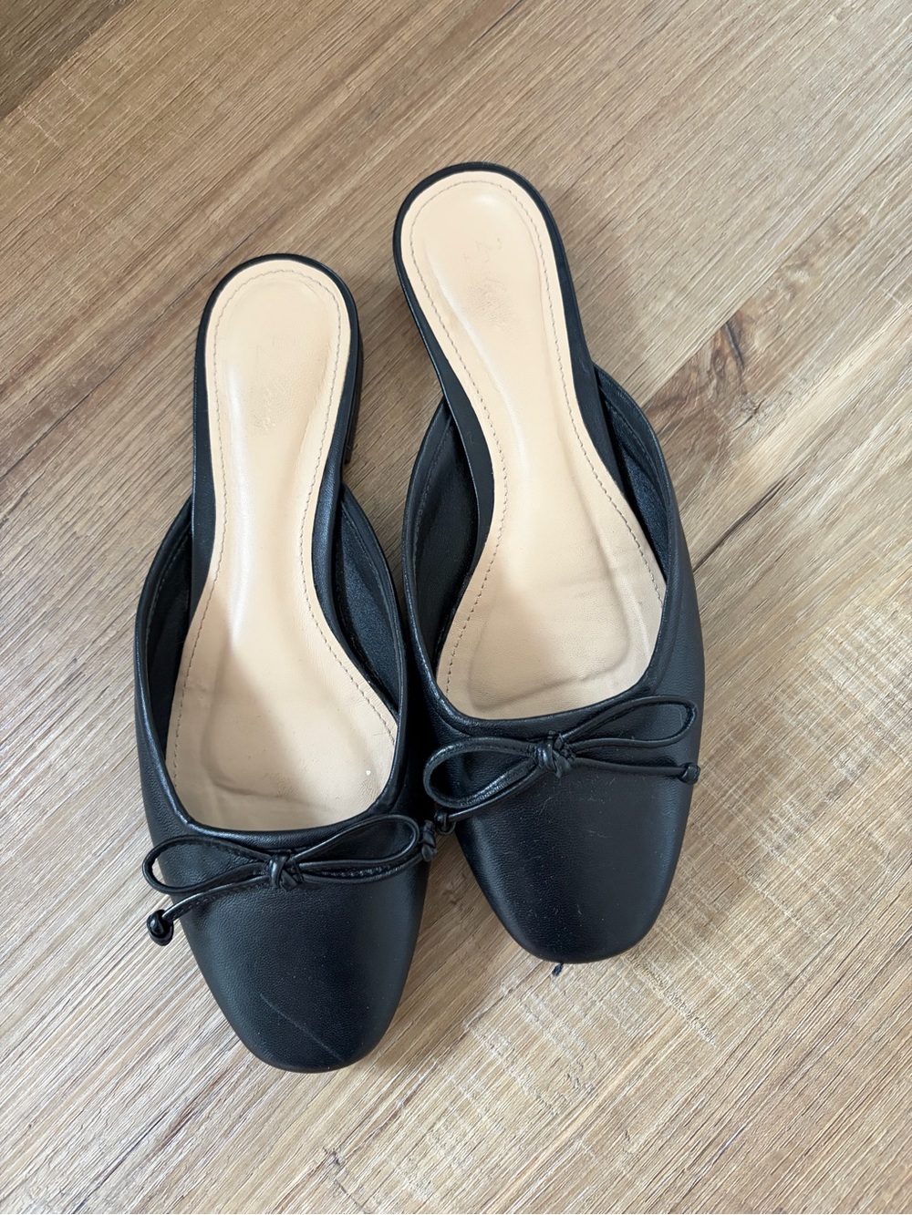 Black leather mules